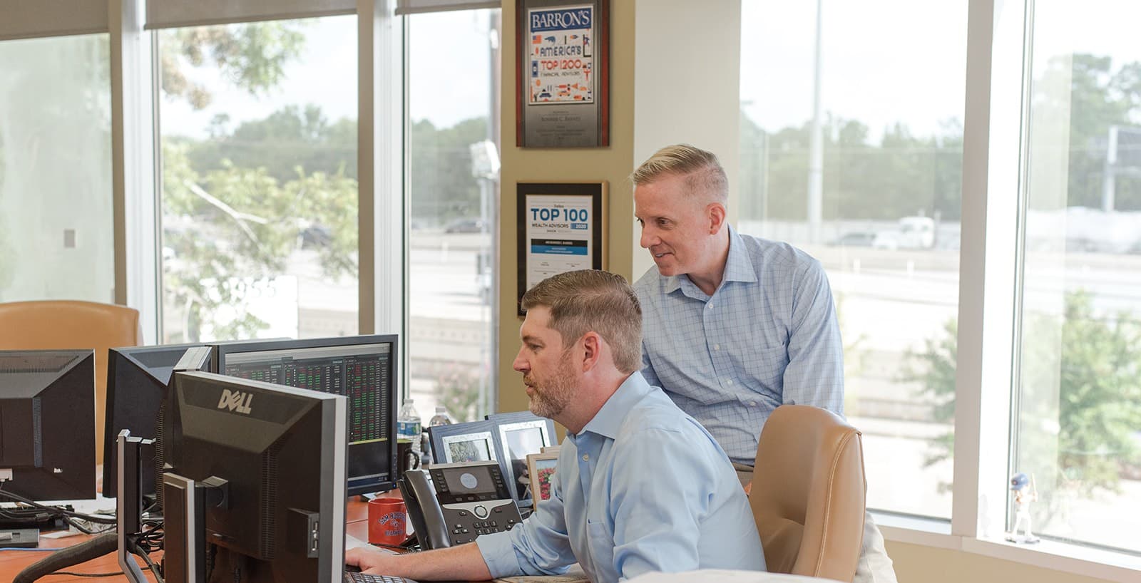 CORDA team collaborating in their office